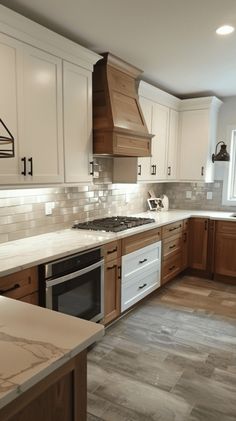 a kitchen with wooden cabinets and white appliances