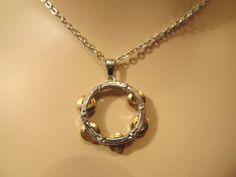 "Fashion jewelry with silver and gold colored tambourine. Featuring moving parts and silver and gold mixed metals. Tambourine is about 1-1/2\" diameter. silvertoned necklace is either 16\" or 18\" with toggle clasps or lobster claw clasp.  Also available in gold-toned necklace. Default is 18\" x with lobster claw clasp. Please email your preference." Teachers Necklace, Music Necklace, Band Necklace, Music Jewelry, Tambourine, Music Gifts, Pink Bracelet, Mixed Metals, Initial Necklace