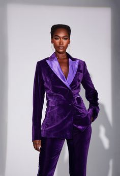 Creamy velvet double-breasted tuxedo with complementing satin lapels and tuxedo stripe Colors: Royal purple; Ice blue Fabric: creamy velvet; satin Jacket: Six button, double-breasted tuxedo jacket with satin peak lapels and front pockets  Pant: Standard waist, slim fit tuxedo pant with 0.5 inch satin tuxedo stripe Wonka Aesthetic, Purple Velvet Suit, Ball Inspiration, Velvet Suit Jacket, Bat Ball, Velvet Tuxedo, Double Breasted Tuxedo, Purple Stuff, Slim Fit Tuxedo