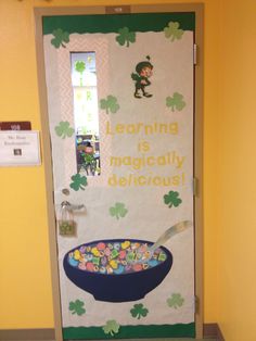 a door decorated with an image of a bowl of cereal and the words learning is magicfully delicious