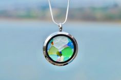 ☀ Sea glass lover? Looking for a unique gift for a woman who appreciates the beauty of all things beach and sea? Then this is the perfect necklace for you. ☀ It's elegant, eye-catching, and makes an ideal birthday gift for your sister, mom, girlfriend, or wife.  The Sea Glass Locket is filled with genuine sea glass of different colors collected from a beach in Slovenia, Europe. It is an original piece of art made with real sea glass.  Each one is made when ordered and includes a different variet Multicolor Recycled Glass Jewelry As A Gift, Multicolor Recycled Glass Jewelry For Gifts, Clear Sea Glass Jewelry For Gift, Clear Sea Glass Jewelry Gift, Clear Sea Glass Jewelry For Gifts, Multicolor Recycled Glass Necklace As Gift, Multicolor Recycled Glass Necklaces For Gifts, Nickel-free Recycled Glass Necklace As A Gift, Nickel-free Recycled Glass Necklace For Gift