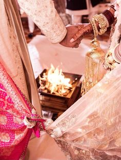 the bride and groom are getting ready to exchange their wedding rings at the ceremony venue