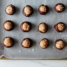 chocolate covered cookies on a baking sheet with sea salt