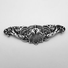 "Gorham antique long ornate sterling silver brooch in open-work designs, featuring floral motifs. Marked 170, date mark for 1893. This darling brooch is 3 1/4\" long, 1\" wide and weighs 16 grams. EA2708" Victorian Antique Silver Brooches, Victorian Antique Silver Brooches For Collectors, Victorian Antique Silver Wedding Brooches, Victorian Engraved Silver Brooch, Victorian Engraved Silver Brooches, Classic Silver Filigree Brooches, Silver Engraved Victorian Brooches, Victorian Silver Engraved Brooch, Antique Silver Brooches With Intricate Design