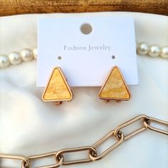 Triangle Studs

"Where edgy meets elegant. ✨ These triangle studs are a statement piece."

Golden outline with shimmry yellow 💛 

"Limited time offer! 

DM for more details ✨

.
.
.
.
#MyPlumBox #jewelleryonline #earringsofinstagram #studs #minimaljewelry #fyp #trendy #jewellerybrand