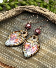 Handmade Heart Ceramic Earrings, Colorful, Pink Czech Glass, Artisan Jewelry, Dangle, Made in the USA, Fast n Free USA Shipping, Gift 🌿These tiny works of art will adorn your earlobes with artisan ceramic colorful hearts, pink faceted Czech glass copper ear wires!💗 Hand forged copper ear wires Free 24hr day Shipping!🌿 Satisfaction guaranteed or your money back. Dangle Heart Earrings As Gift, Unique Heart Drop Earrings As Gift, Artisan Heart Earrings As Gift, Artisan Heart Earrings For Pierced Ears As Gift, Artistic Heart-shaped Earrings For Gift, Artistic Heart Earrings As Gift, Artistic Pink Jewelry With Artistic Design, Artisan Multicolor Heart-shaped Jewelry, Artistic Dangle Heart Earrings As Gift