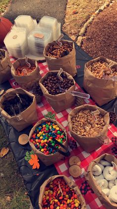 a table topped with lots of different types of candies