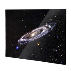 an image of the andromidus galaxy in outer space with stars around it