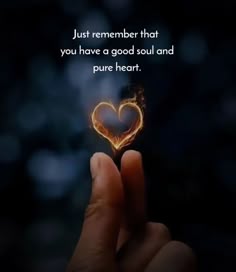 someone holding a heart in their hand with the words just remember that you have a good soul and pure heart