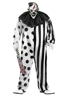 a man dressed in a clown costume with black and white polka dots on his face