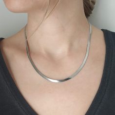 Our delicate stainless steel snake flat necklace is a contemporary necklace that is the perfect complement to your everyday looks. The necklace is of high quality and can accompany every style you choose! It is the perfect gift for you and your loved ones! Very elegant, yet minimalistic, our necklace is the perfect gift for special occasions such as weddings, birthdays, anniversaries, and holidays, and also a unique proposal for your loved ones, even yourself. Please keep in mind that the neckla Silver Stainless Steel Snake Chain Necklace, Minimalist Silver Snake-shaped Jewelry, Silver Nickel-free Snake Chain Necklace, Nickel-free Silver Snake Chain Necklace, Silver Snake Shape Necklace With Clavicle Chain, Silver Snake Chain Clavicle Necklace As A Gift, Silver Snake Shape Clavicle Chain Necklace, Silver Herringbone Necklace With Box Chain For Everyday, Stainless Steel Snake Chain Necklace