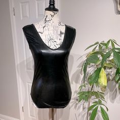 Nwot Faux Leather Vintage Y2k Glossy Shiny Wet Keyhole Bodysuit Monokini One Piece Top Blouse Rave Punk Rockstar Club Nigh Tout Whimsygoth No Tag With Size, Brand Or Fabric Sz S/M Mannequin Is Sz S For Your Reference Black Rave Bodysuit For Parties, Black Fitted Rave Bodysuit, Edgy Stretch Bodysuit For Club, Black Gothic Bodysuit For Costume Party, Edgy Black Party Bodysuit, Fitted Sleeveless Rave Bodysuit, Halloween Stretch Bodysuit For Night Out, Gothic Stretch Bodysuit For Night Out, Sleeveless Rave Bodysuit