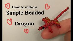 a hand holding a beaded dragon on top of a piece of paper with the words how to make a simple bead dragon