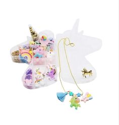 the unicorn necklace and earring set is in its plastic case