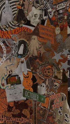 an assortment of halloween stickers and decals on a piece of cardboard with torn paper