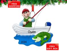 a christmas ornament with a fisherman on a boat and an alligator in the water