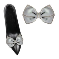 two pairs of shoes with bows on the front and side, one in black leather