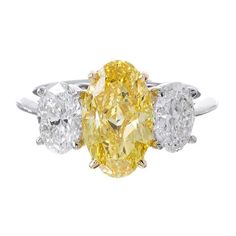 This lovely canary diamond engagement ring features a 1.50 Ct. natural fancy yellow oval cut diamond with VS1 clarity. Metal : 14K Two Tone, 18K Two Tone, Solid Platinum/18K Yellow Gold Setting Type : Prong Total Carat Weight : 2.00 Carats Type : Natural Genuine Diamond Shape : Oval Cut Carat Weight : 1.50 Ct. (GIA Certified) GIA Certification : Included, Contact us to get the copy! Cut Quality : Excellent Color : Canary Fancy Yellow Natural Clarity : VS1 Type : Natural Genuine Diamonds Shape : Yellow Diamond Pear-shaped Ring, Yellow Pear-shaped Diamond Rings, Yellow Oval Diamond Ring Fine Jewelry, Yellow Oval Diamond Ring, Fine Jewelry, Fine Jewelry Yellow Oval Diamond Ring, Luxury Yellow Oval Rings, Yellow Oval Brilliant Cut Diamond Ring, Oval Yellow Diamond Ring For Anniversary, Yellow Pear-shaped Ring With Center Stone