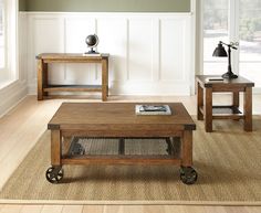 a living room scene with focus on the coffee table and two end tables in the background