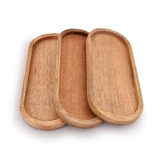 three wooden trays sitting on top of each other