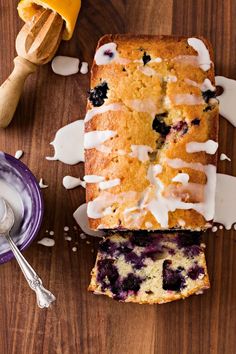 a loaf of lemon blueberry bread with icing