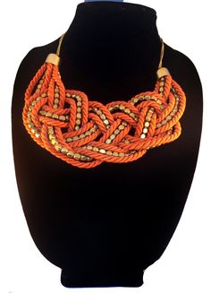 "ORANGE BIB NECKLACE BACK BY POPULAR DEMAND \" THE Nautical bib Necklace\" This time I created it in Orange and gold A great addition to your holiday wardrobe. Make a statement this fall, wear it with your dresses or with a sweater!! Work this piece with almost anything.  Made on a Gold Chain. Length of Necklace is 20 inches and 2 inch extension have been added for length adjustment . A very Elegant piece.  The Necklace has a lobster clasp for ease of wear and removal.  A beautiful Gift for some Orange Statement Necklace, Jewelry Gold Necklace, Schmuck Gold, Silk Thread Jewelry, Boho Style Earrings, Silver Bracelets For Women, Chandbali Earrings, Orange And Gold, Thread Jewellery