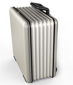 a silver suitcase with black handles on an isolated white background