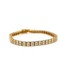 This breathtaking 5 Carat Bar Set Diamond Tennis Bracelet in 14k Yellow Gold is the perfect gift for a special occasion. The elegant and sporty bracelet features eighty-eight (88) .056 carat round brilliant cut diamonds. The diamonds are set in pairs in-between stylish 14 karat yellow gold channel bars. Geometric, sparkling, and expertly designed. The bracelet measures 7.52 inches long. A modern beauty in diamonds and yellow gold! Pair with some diamond earrings to complete the look! Diamond Tennis Bracelet, Tennis Bracelet Diamond, Shop Engagement Rings, Bar Set, Tennis Bracelet, Round Brilliant Cut Diamond, Brilliant Cut Diamond, Round Brilliant, Shop Necklaces