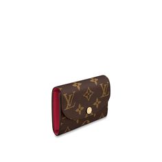 The tiny rosalie coin purse in monogram canvas is given a feminine feel by its colorful grained-leather lining. For such a compact design, it is surprisingly spacious, containing a gusseted compartment, two card slots and a zipped coin pocket with a leather pull. Louis Vuitton Purses, Louis Vuitton Coin Purse, Louie Vuitton, Louis Vuitton Store, Lv Purse, Cute Wallets, Louis Vuitton Purse, Louis Vuitton Wallet, Wallet Pouch