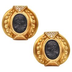 Etruscan Revival earrings. Gorgeous, oversized and bold pair, crafted with Etruscan-Roman revival patterns in solid yellow gold of 18 karats, with satin finish. Suited with posts for pierced ears and a pair of comfortable omega backs for fastening clips. Mount into bezels, with a pair of cameo depicting the portrait bust of the Greek goddess Flora, carved from natural black onyx, with a weight of about 9 carats. Embellished at the top parts, with a pave setting of 26 calibrated round brilliant c Empire Romain, Pave Setting, Greek Goddess, Fine Jewellery Earrings, Pierced Ears, Round Brilliant Cut Diamond, Solid Yellow, Brilliant Cut Diamond, Satin Finish