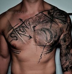 a man with tattoos on his chest and arm