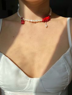 Red coral, pearl and sea shell choker necklace. Delicately made by hand with freshwater pearls, sea bamboo coral beads and natural sea shells. One of a kind. These necklaces are more than just a final touch to your look, it's a bold statement of who you are. It's a way of showcasing your aesthetic and letting your inner self shine. Available in three styles: STYLE I: White Sea shells and sea bamboo coral beads. Necklace length: 37 cm // 14.56 inch + 5cm // 2 inch extension chain. Two dangle pendants (length: 3cm). Stainless steel lobster clasp closure (it's hypoallergenic, doesn't rust or tarnish). STYLE II: Freshwater pearls and sea bamboo coral beads. Necklace length: 37 cm // 14.56 inch + 5cm // 2 inch extension chain. Stainless steel lobster clasp closure (it's hypoallergenic, doesn't Cheap Beaded Necklaces With Lobster Clasp For Beach, Coral Pearl Necklace, Red Pearl Necklace With Pearl Charm As Gift, Red Pearl Necklace With Charm As Gift, Red Pearl Beaded Necklaces With Pearl Chain, Adjustable Red Pearl Necklace, Red Pearl Necklace With Pearl Drop, Red Pearl Necklace With Pearl Chain, Handmade Red Coral Pearl Necklace