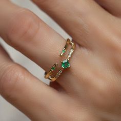 This is a unique Emerald and Diamonds engagement ring, set with Emerald and white Diamonds in a 14K/18K gold band, the perfect alternative boho wedding ring. Materials & Colors: ✤ 14K OR 18K yellow/rose/white gold. Please select your favorite color from the drop-down menu, when ordering. ✤ Conflict-free diamonds ✤ Center lab-grown Emerald: 2.8 mm ✤ Avg. Carat Weight for side diamonds: 0.04 CT ✤ Side white diamonds Clarity: SI-VS, Color: E-G ✤ Your item will arrive in a beautiful gift box, ready Gold Emerald Open Ring For Wedding, Elegant Gold Emerald Toe Ring, Elegant Gold Stackable Rings For Proposal, Gold Stackable Emerald Ring For Wedding, Gold Emerald Stackable Wedding Rings, Gold Emerald Stackable Rings For Wedding, Gold Stackable Bypass Ring For Wedding, Yellow Gold Emerald Open Ring For Wedding, Gold Rings With Single Cut Diamonds And Emerald