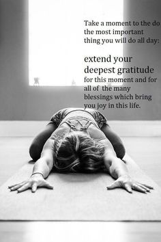 a woman laying on her back in a yoga pose with the words, take a moment to the do the most important thing you will do all day extend your deepest gratitude for this moment