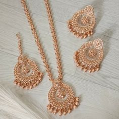 This Beautiful Rose Gold Polki Stone Long Mala Necklace Rani Haar Set for all Vibrant colors for your special events.    Set Includes: Necklace, Tikka and Chandbali Earrings  Dimension:- necklace:- Length 13.5"  Earrings:- Drop Length 3" wide 2"  Approximately. Rani Haar, Chandbali Earrings, Mala Necklace, Earrings Drop, Beautiful Rose, Necklace Length, Beautiful Roses, Long Necklace, Or Rose