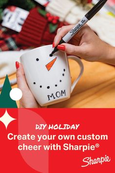 a woman is holding a coffee mug with a snowman on it and the words, diy holiday create your own custom cheer