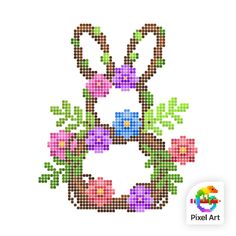 a cross stitch bunny with flowers on it's chest and the words pixel art