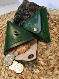 Handmade leather coin purse in the origami style.  This coin purse can be opened from both sides, one handed making it easy to get to your change or coins.  Easily fits into your front pants pocket to keep coins from jingling in your pocket.   Great gifts for anyone looking to keep change.  Snap is silver and leather is green.  Two celtic designs to choose from. Green Coin Purse With Coin Pocket Gift, Green Leather Coin Purse With Coin Pocket, Green Leather Coin Purse For Gift, Celtic Dragon, Pants Pocket, Gifts For Anyone, Leather Coin Purse, Minimalist Wallet, Celtic Designs