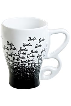 a black and white coffee cup with writing on the side, sitting in front of a white background