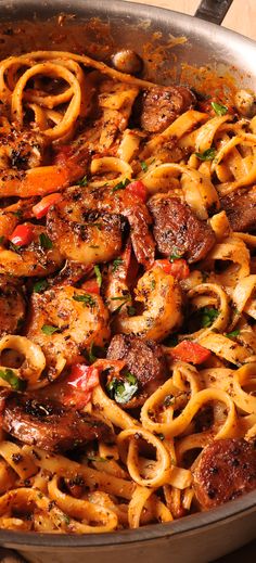 Shrimp and Sausage with Fettuccine Pasta, made with Cajun Creamy Sauce in a skillet Shrimp Sausage Pasta, Cajun Shrimp Pasta With Sausage, Sausage And Shrimp Recipes, Creamy Cajun Shrimp, Shrimp And Sausage Pasta, Pasta Fettuccine, Pasta Garlic, Creamy Cajun Shrimp Pasta, Weeknight Pasta