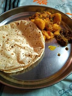 a plate with some food on it sitting on a table