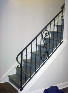 a stair case next to a set of stairs