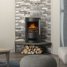 a fireplace with logs in front of it