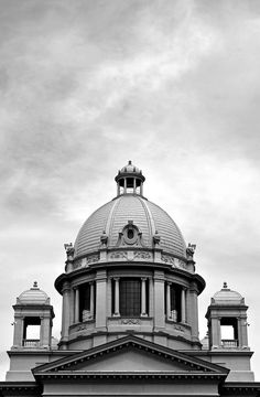 an old building with two domes on top