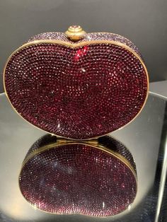 A ladies estate Judith Leiber red crystal heart shape minaudiere with a heart shape garnet push button clasp.  The minaudiere comes with a 40 inch chain, a mirror, and a change purse. Gem Water, Rose Gold Mens Ring, Judith Leiber Couture, Garnet And Diamond Ring, Gold Lotus, Rose Gold Morganite, Diamond Fashion Rings, White Diamond Ring, Judith Leiber