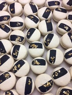 black and white striped cookies with gold sprinkles