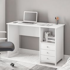 a white computer desk with a laptop on it