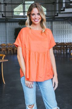 Get ready to rock that babydoll look with our Luciana top! Designed with an oversized fit, this cotton top features short sleeves, a round neck, and a handy chest pocket. Perfect for a playful and effortless style! General Info: 70% Cotton, 30% Linen Hand Wash Cold; Line Dry Babydoll Style Oversized Short Sleeves Round Neck Chest Pocket Back Button Closure Fit Guide: Shape & Fit: Relaxed, Oversized Fabric Elasticity: No Stretch Fabric Texture: Linen Blend Model Info: Height: 5’10” | Bust: 32" | Waist: 24" | Hip: 34” | Size Shown: Small Cotton Short Sleeve Solid Color Blouse, Short Sleeve Solid Color Cotton Blouse, Solid Color Short Sleeve Cotton Blouse, Cotton Blouse With Short Sleeves In Solid Color, Cotton Tops With Side Pockets For Summer, Summer Blouse With Pockets For Everyday Wear, Summer T-shirt With Side Pockets For Everyday, Orange Short Sleeve Tops With Pockets, Cotton Short Sleeve Blouse With Pockets