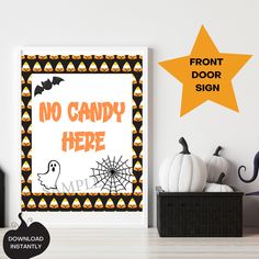 a halloween poster with the words no candy here and pumpkins in front of it