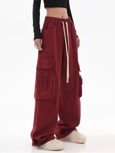 Embrace the effortless style with these Wide Leg Double Side Pocket Pants that merge comfort and chic.
Crafted from a soft fabric, these pants offer a relaxed straight fit enhanced by the practicality of side pockets. The retro red hue adds a touch of edgy sophistication to your wardrobe, making them a perfect piece for expressing your personal style. With a focus on fine craftsmanship, these pants are perfect for those who value functionality without compromising on design.
Versatile and easy t Hippie Inspired Outfits, Red Cargo Pants, Hip Hop Cargo Pants, Hip Hop Women, Vintage Hip Hop, Plaid Pullover, Pants Women Fashion, Cooler Look, Straight Trousers